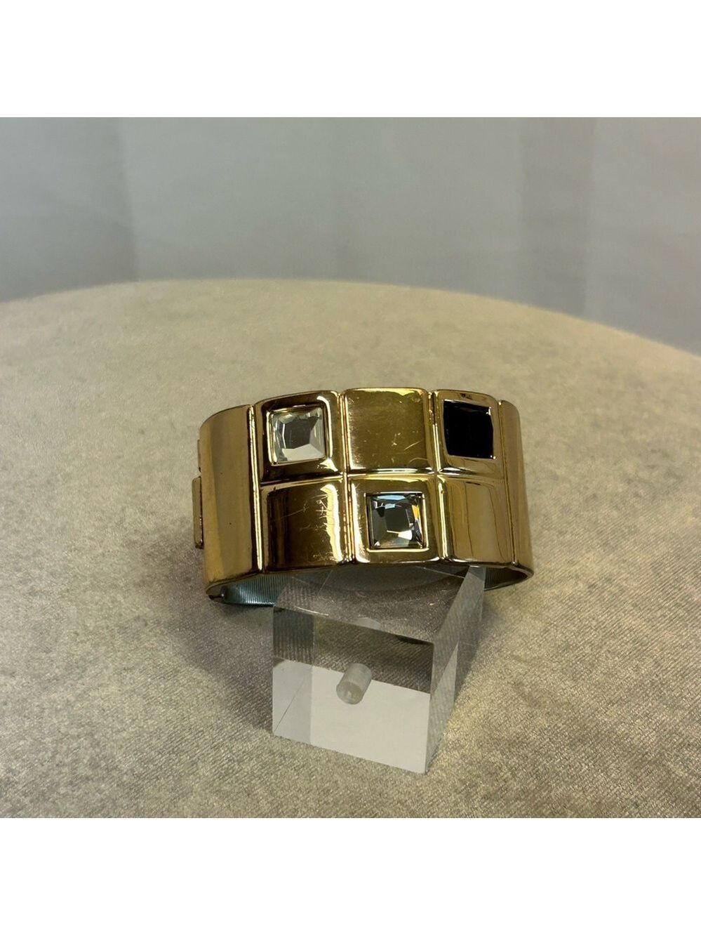 Chico’s gold-toned cuff bracelet with square-cut clear and black stones